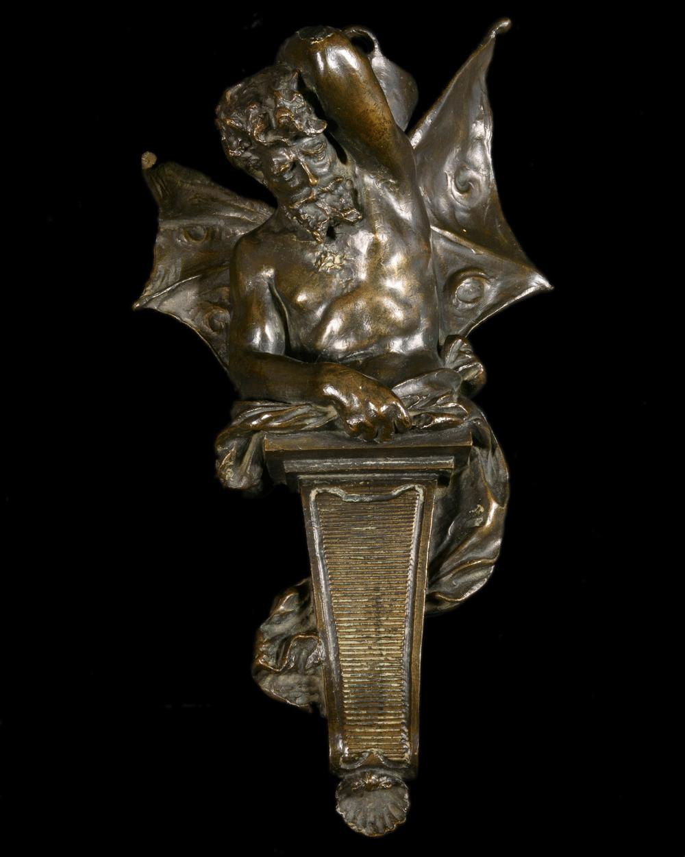 WALL CONSOLE IN BRONZE DEPICTING A WINGED DEMON - RELICS